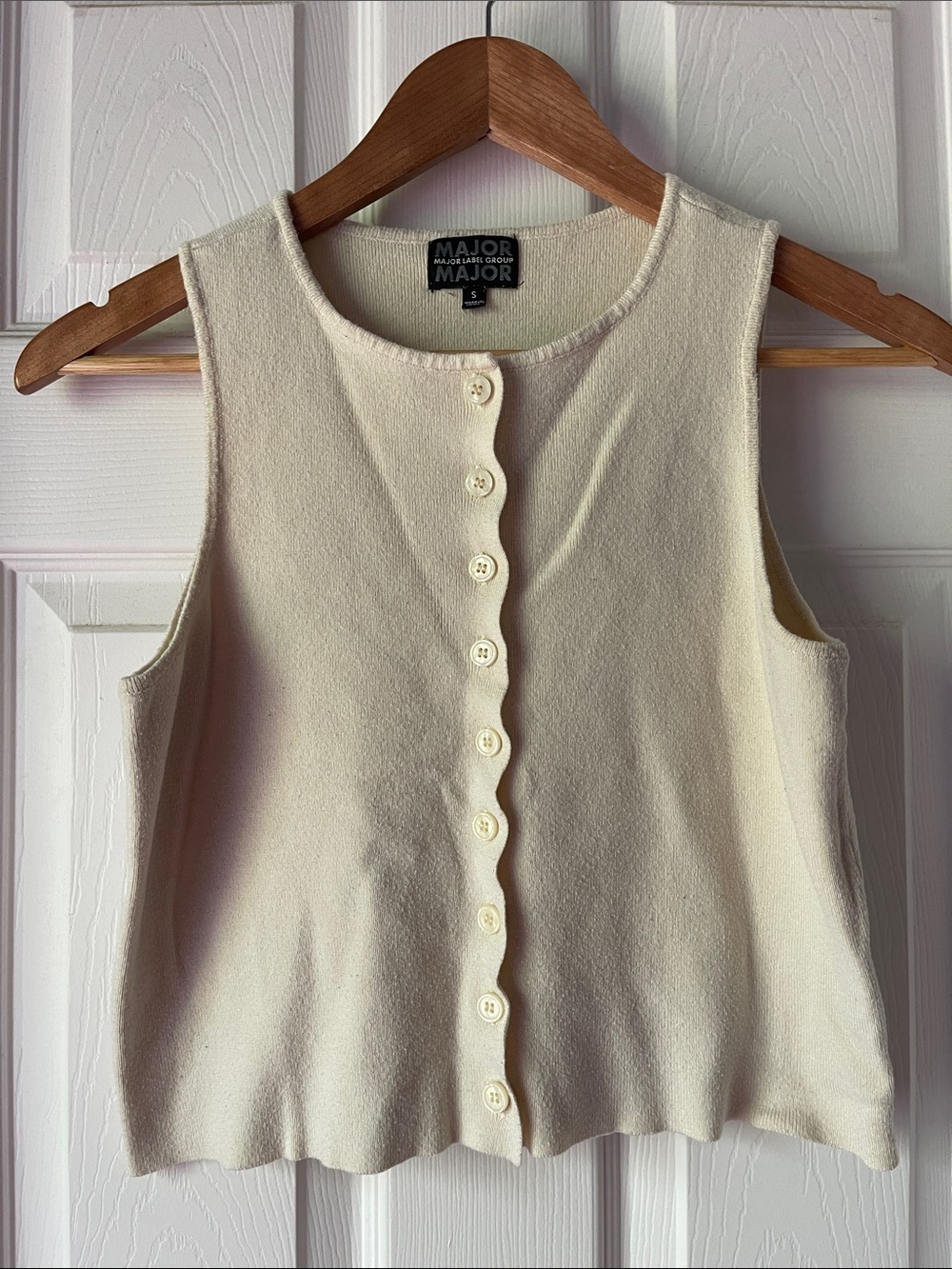 sleeveless button-front butter knit top